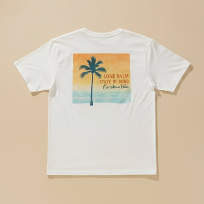 Person wearing a t-shirt with a palm tree design and text on a beach
