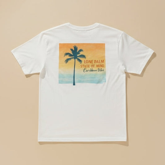 Person wearing a t-shirt with a palm tree design and text on a beach